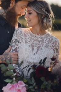 bohemian elopement couple with bouquet