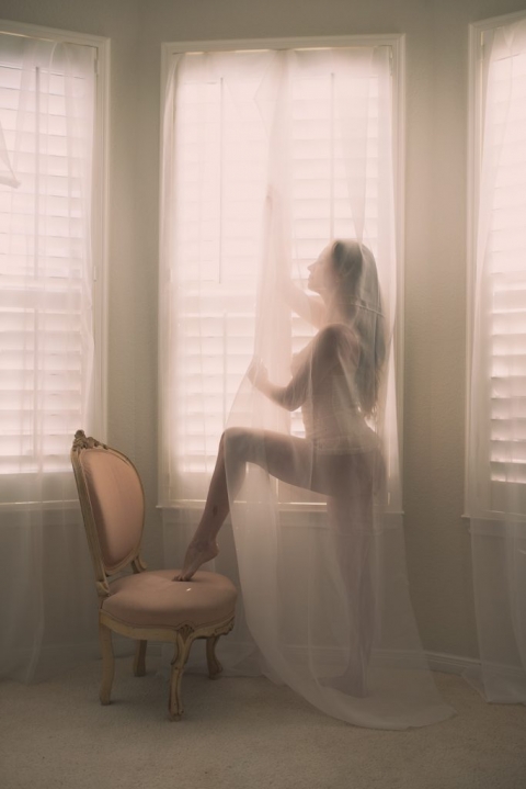 dreamy boudoir session chair and windows
