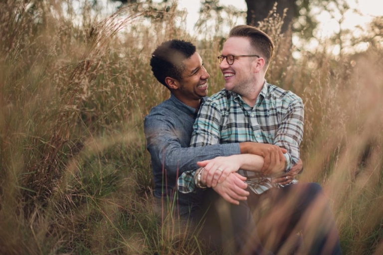 houston gay engagement couple in tall grass