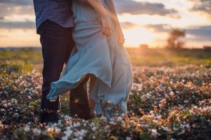 blue dress couple at sunset in flowers charleston south carolina