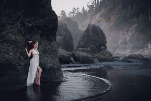 white dress portrait in water ruby beach seastack