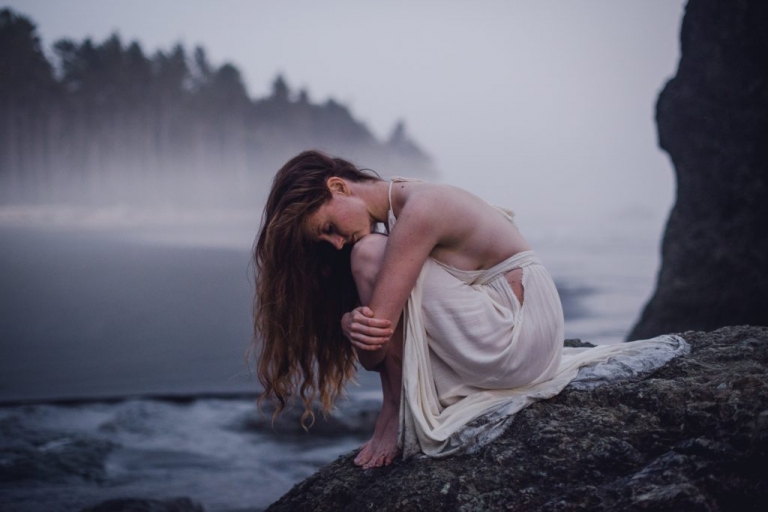 solitude woman white dress portrait in water ruby beach seastack