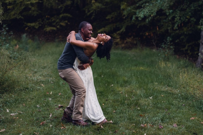 couple dancing and laughing during adventure session in virginia