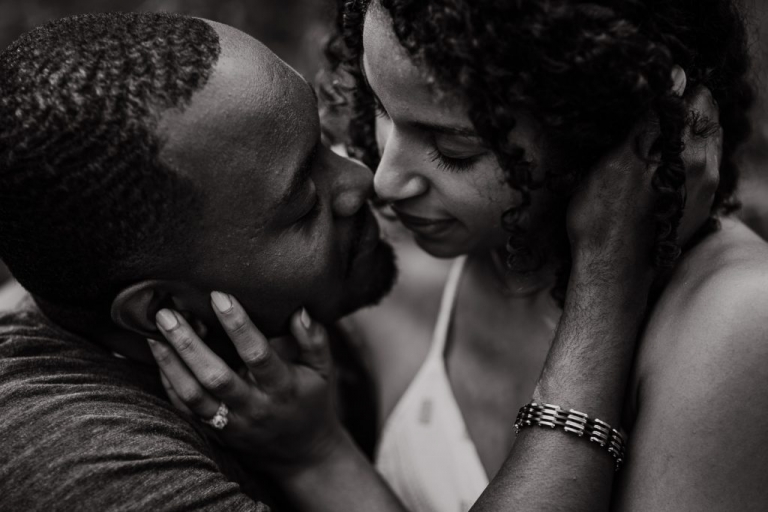 couple face to face during adventure session in virginia