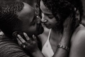 couple face to face during adventure session in virginia