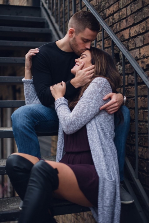 engagement couple on stairs