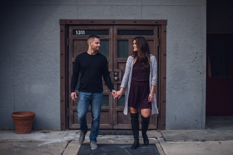 engagement couple walking