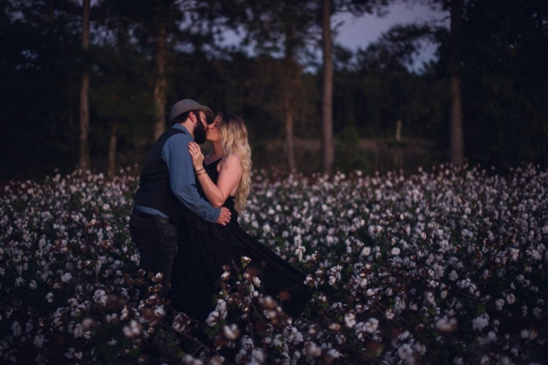 couples adventure session in cotton field