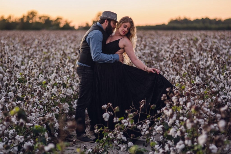 black dress swishing in cotton field