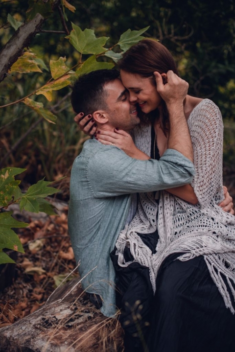 adventurous couple snuggling