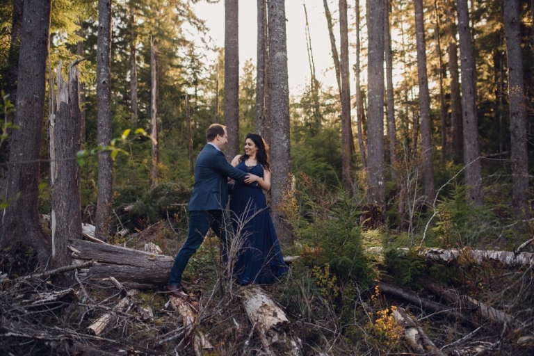 adventurous couple walking in the woods during olympic national park engagement session