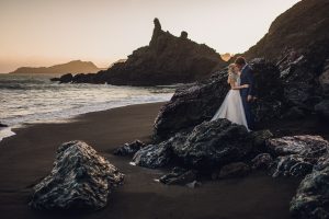 adventure couple black sand beach california elopement
