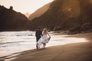 adventure couple black sand beach california elopement