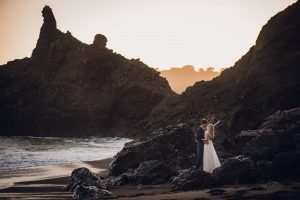 adventure couple black sand beach california elopement