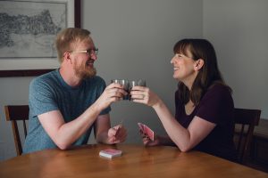 happy couple, playing cards, couples lifestyle photo session