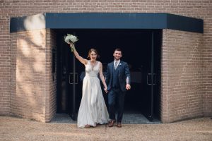 intimate summer elopement, Rothko chapel, Houston intimate elopement, Texas intimate elopement photographer, navy blue suit, sleeveless wedding dress, summer wedding