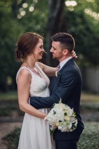 intimate summer elopement, Rothko chapel, Houston intimate elopement, Texas intimate elopement photographer, navy blue suit, sleeveless wedding dress, summer wedding, greenery, bride and groom, just married