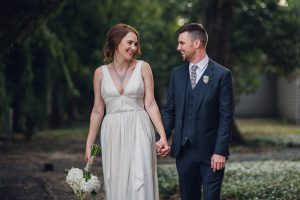 intimate summer elopement, Rothko chapel, Houston intimate elopement, Texas intimate elopement photographer, navy blue suit, sleeveless wedding dress, summer wedding, greenery, bride and groom, just married