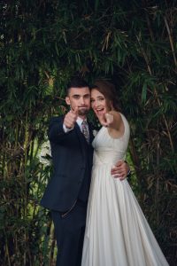 intimate summer elopement, Rothko chapel, Houston intimate elopement, Texas intimate elopement photographer, navy blue suit, sleeveless wedding dress, summer wedding, greenery, bride and groom, just married