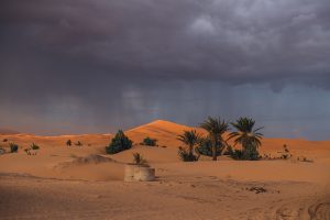 Sahara Desert, sand dunes, Morocco, rain clouds, adventure photography and elopements