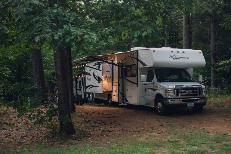 rv parked in the woods in saratoga springs new york