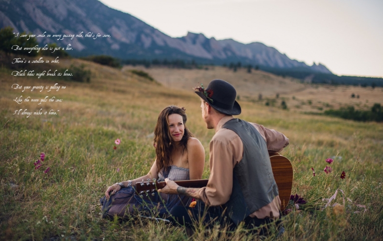 bohemian boulder couple on a picnic date in the mountains