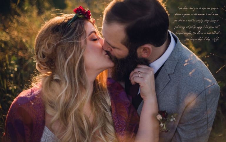 couple kisses in golden grass at sunset after their intimate elopement