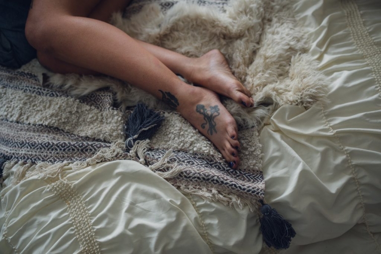 woman's foot tattoo of decorative scissors 